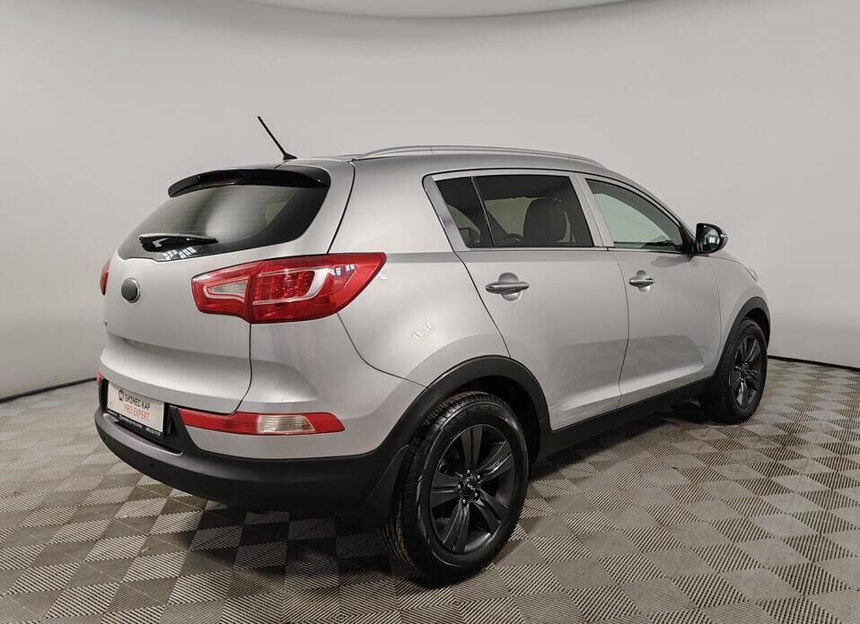Kia Sportage, III 2.0 AT (150 л.с.)