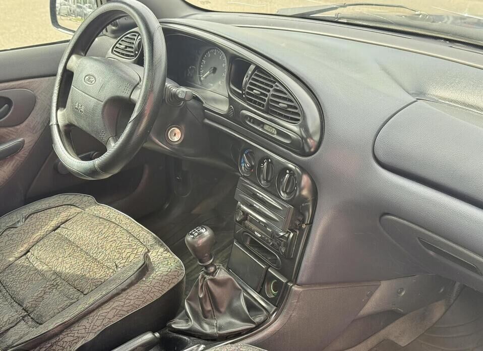 Ford Mondeo, II 1.6 MT (90 л.с.)