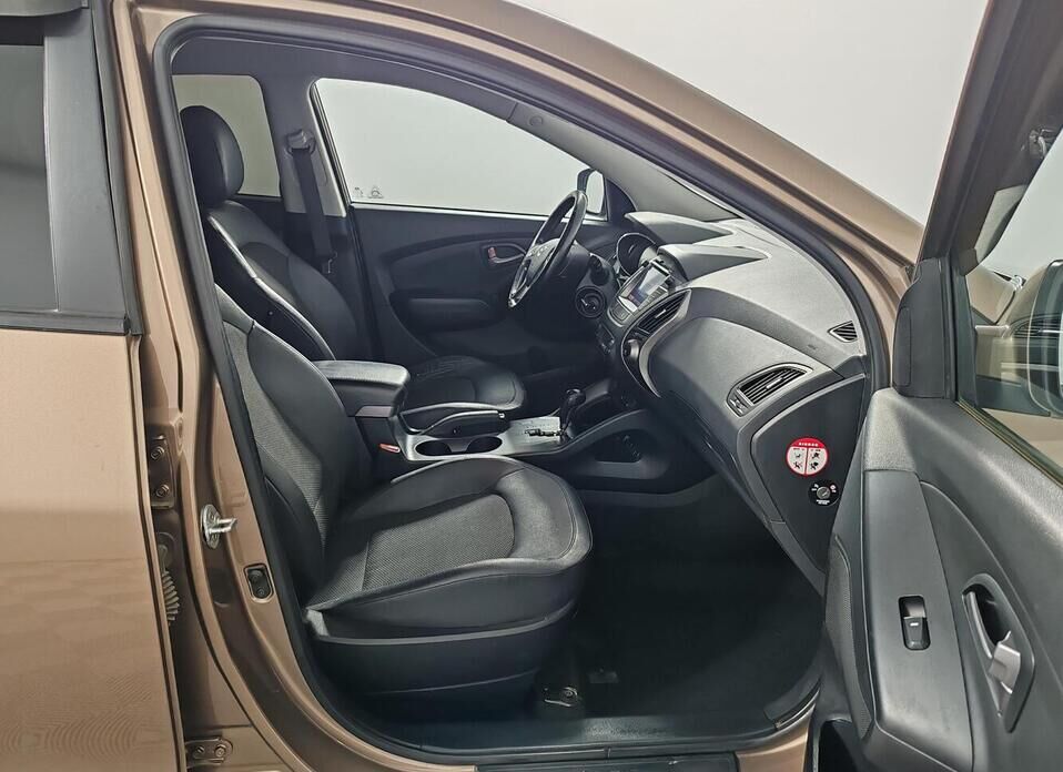 Hyundai ix35, I Рестайлинг 2.0 AT (150 л.с.)